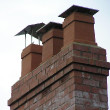 A collection of chimney pots