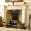 A grand white fireplace